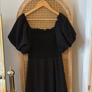 Elegant Black Puff Sleeve Dress. Brand new with tags. Size Small.